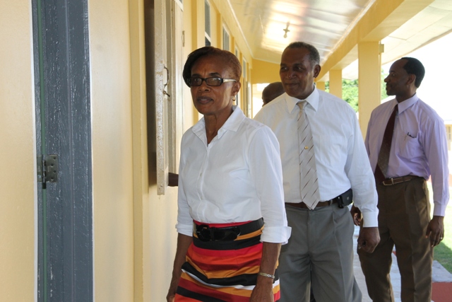 (L-R) Deputy Principal of the Gingerland Secondary School Lineth Williams guides Premier of Nevis and Minister of Education Hon. Vance Amory, Assistant Secretary in the Premier’s Ministry Kevin Barrett and Permanent Secretary in the Premier’s Ministry Wakely Daniel on a tour of the school on September 07, 2015